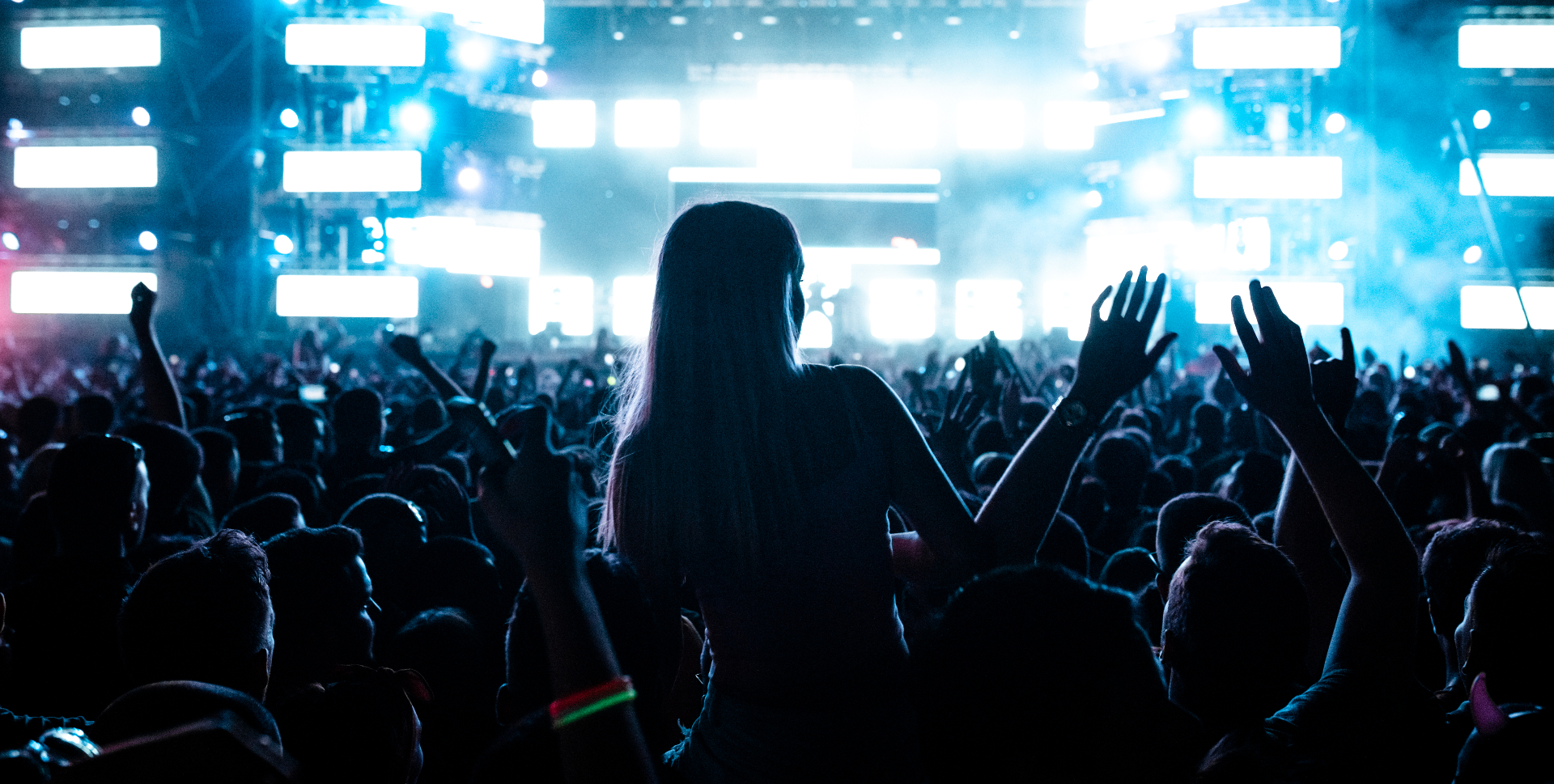 Festival crowd with hands raised